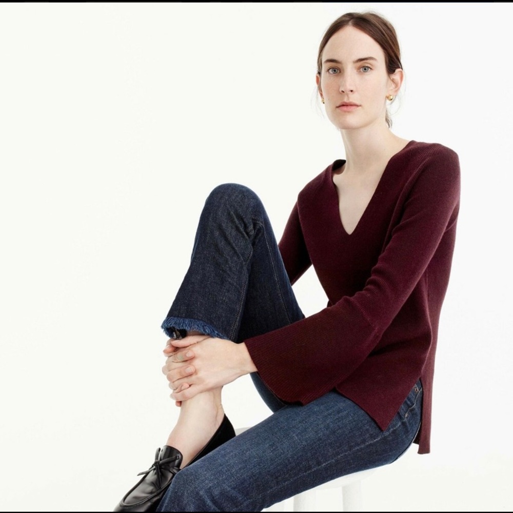 Peplum bell-sleeve v-neck sweater.